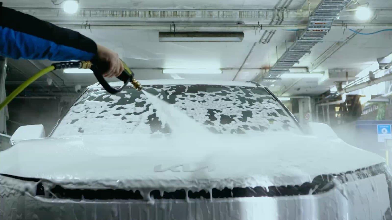 CLTCH technician foam-washing and drying dealer stock